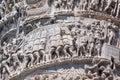 Architectural detail from ancient Marcus Aurelius Column in front of Palazzo Chigi in city of Rome, Italy Royalty Free Stock Photo