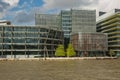 View of architecture of the city of London in UK alongside the riverbank of River Thames