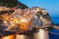 Stunning view of the beautiful and cozy village of Manarola in the Cinque Terre Reserve at sunset. Royalty Free Stock Photo