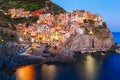 Stunning view of the beautiful and cozy village of Manarola in the Cinque Terre Reserve at sunset. Royalty Free Stock Photo