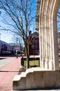 A view of a archway and a stop sign in Salem, Boston Royalty Free Stock Photo