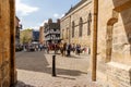 A view of the area and buildings outside of the Cathedral, in Lincoln, UK, with a horse and cart on Royalty Free Stock Photo