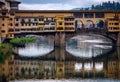 View from the Arno River to the Ponte Vecchio bridge. The old city of Florence. Italy. Royalty Free Stock Photo