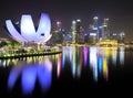 View of the Art Science Museum and Marina Bay Financial Centre in the evening in Singapore. Royalty Free Stock Photo