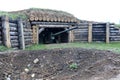 Artillery gun in dugout Royalty Free Stock Photo