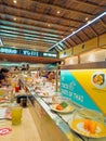 View of assorted Japanesse food over a table, inside of a Tokio Sushi conveyor belt sushi