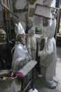 View of assorted religious statues in an old workshop in Lecce, Italy