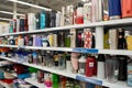 View of assorted reusable bottles and plastic drinkware on store shelves. Royalty Free Stock Photo