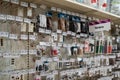 View of assorted sewing notions and buttons displayed on a store wall. Royalty Free Stock Photo