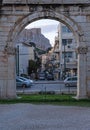 View of Athens street through the arch of the Temple of Olympian Zeus, Greece. Royalty Free Stock Photo