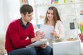 View of an Attractive couple doing administrative paperwork Royalty Free Stock Photo