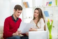 View of an Attractive couple doing administrative paperwork Royalty Free Stock Photo