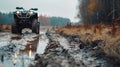 A view of an ATV driving through the mud. off-road travel . Royalty Free Stock Photo