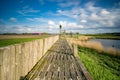 View on the authentic old harbor with wooden seawall and wooden Jetty, Schokland, Netehrands