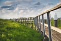 View on the authentic old harbor with wooden seawall and wooden Jetty, Schokland, Netehrands