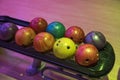 View of automated ball rack system in bowling center, facilitating seamless delivery of bowling balls. Royalty Free Stock Photo