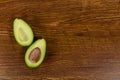 View of an avocado on wood table background Royalty Free Stock Photo