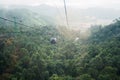 View of Ba Na Hills Mountain in the fog from Cable car. Landmark and popular. Da Nang, Vietnam and Southeast Asia travel concept Royalty Free Stock Photo