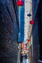 A view back down a narrow alleyway in Chinatown in Victoria British Colombia, Canada