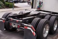 Rear of the tractor unit. Visible fifth wheel couplings are fitted to a tractor unit to connect it to the trailer