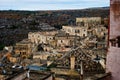 The view on the back side of the Italy citoy of Matera by river canyon with undergrounds palaeolithic cave Royalty Free Stock Photo