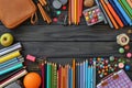 view Back to school supplies background education essentials in array