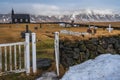 Black church, Budir, West Iceland - February 23, 2019 : View from the backside on the graveyard and the famous black church of Bud