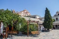 Iew on backyard of Monastery of Archangel Michael in Greece, Thasos Island, with vivid orange walls and roof,