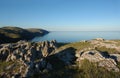 Beautiful view of Baikal Lake from the high cliffs Cape Ulan-Zaba on a clear summer evening Royalty Free Stock Photo