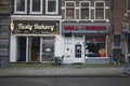 View of a bakery and a burger shop