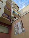 View of Balconies Displaying Spain`s Flag and Public Art