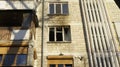 View of the balcony and a broken window after the fire in block of flats Royalty Free Stock Photo