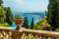 A view from a balcony in the Garden of Villa Comunale over the shoreline of Taormina, Sicily Royalty Free Stock Photo