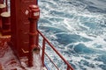 View of Ballast Water exchange process onboard of a ship using flow-through method underway in open ocean. Overflow method through