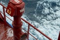 View of Ballast Water exchange process onboard of a ship using flow-through method underway in open ocean. Overflow method through