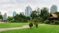 View of Bangkok skyline from Lumphini Park, Thailand. Royalty Free Stock Photo