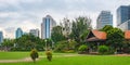 View of Bangkok skyline from Lumphini Park, Thailand. Royalty Free Stock Photo