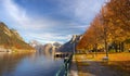 View of a bank of Ebensee lake with a maple alley