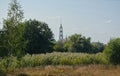 View from the bank of the Tsna river to the bell tower of the Kazan monastery in the city of Tambov, Russia Royalty Free Stock Photo