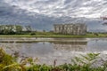 A view from the banks of the tidal estuary of the Carew River, Pembrokeshire at dawn