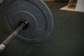 Close up view of barbell on floor in gym Royalty Free Stock Photo