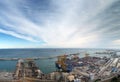 View of barcelona docks and harbour with shipping containers being loaded, warehouses grain silos and railway lines