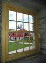 Window view of Tannery from inside Shaker Round Stone Barn