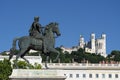 View of Basilica of Notre Dame de Fourviere and Louis XIV statue Royalty Free Stock Photo