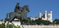 View of Basilica of Notre Dame de Fourviere and Louis XIV statue Royalty Free Stock Photo