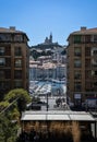 View of the Basilique Notre-Dame de la Garde on the hill above the port of Marseille Royalty Free Stock Photo