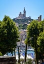 View of the Basilique Notre-Dame de la Garde on the hill above the port of Marseille Royalty Free Stock Photo
