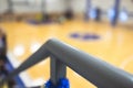 View of basketball court hall indoor venue with junior teenage school team playing in the background, basketball match game on Royalty Free Stock Photo