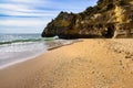 View of Batata beach in Algarve Portugal under a clear blue sky