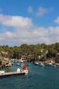 View of the Bay of Cala Figuera with many yachts against a blue sky with clouds. Majorca. Spain